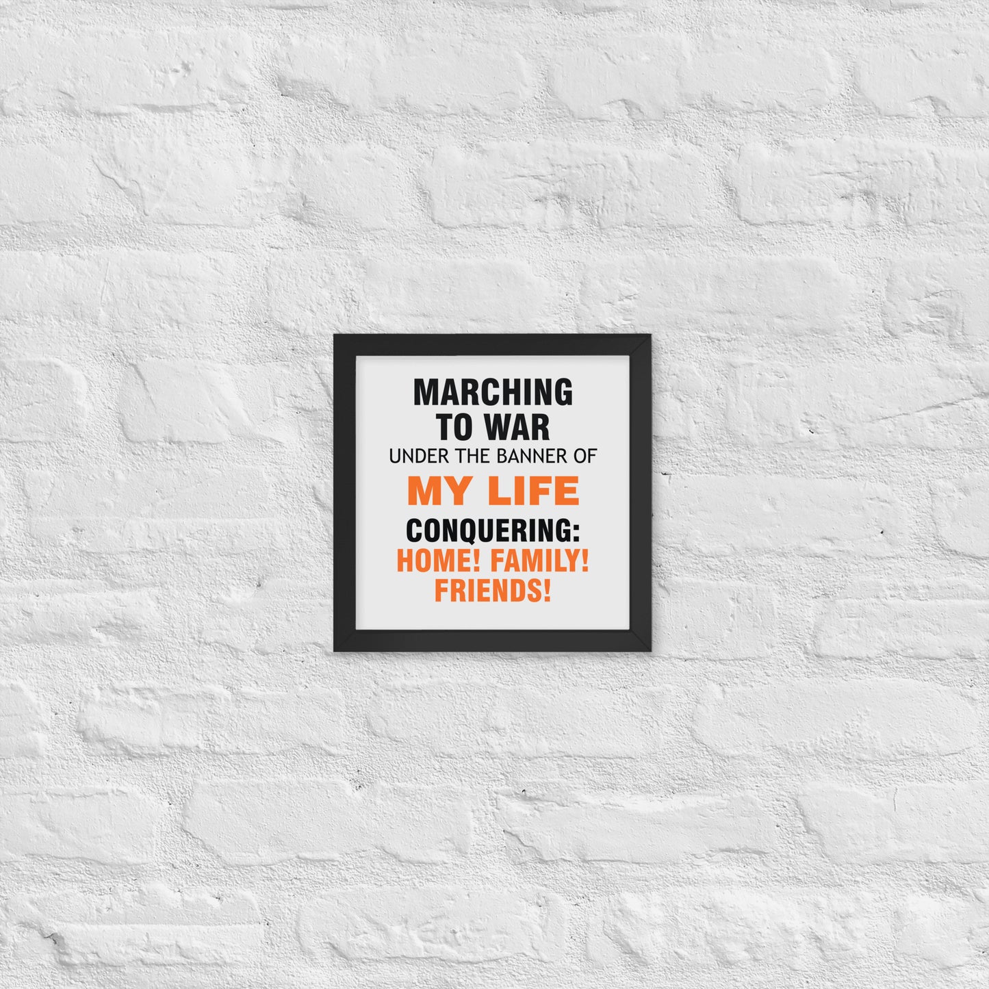 Minimalist motivational poster with black and orange typography saying “Marching to war under the banner of my life, conquering: home, family, friends.” Modern wall art for home, office, or creative space.