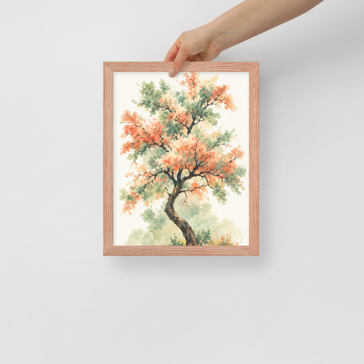 Watercolor painting of a blossoming tree with coral and sage green leaves, twisting trunk in a quiet meadow, framed wall art print ready to hang, JMTR Jeometry Store