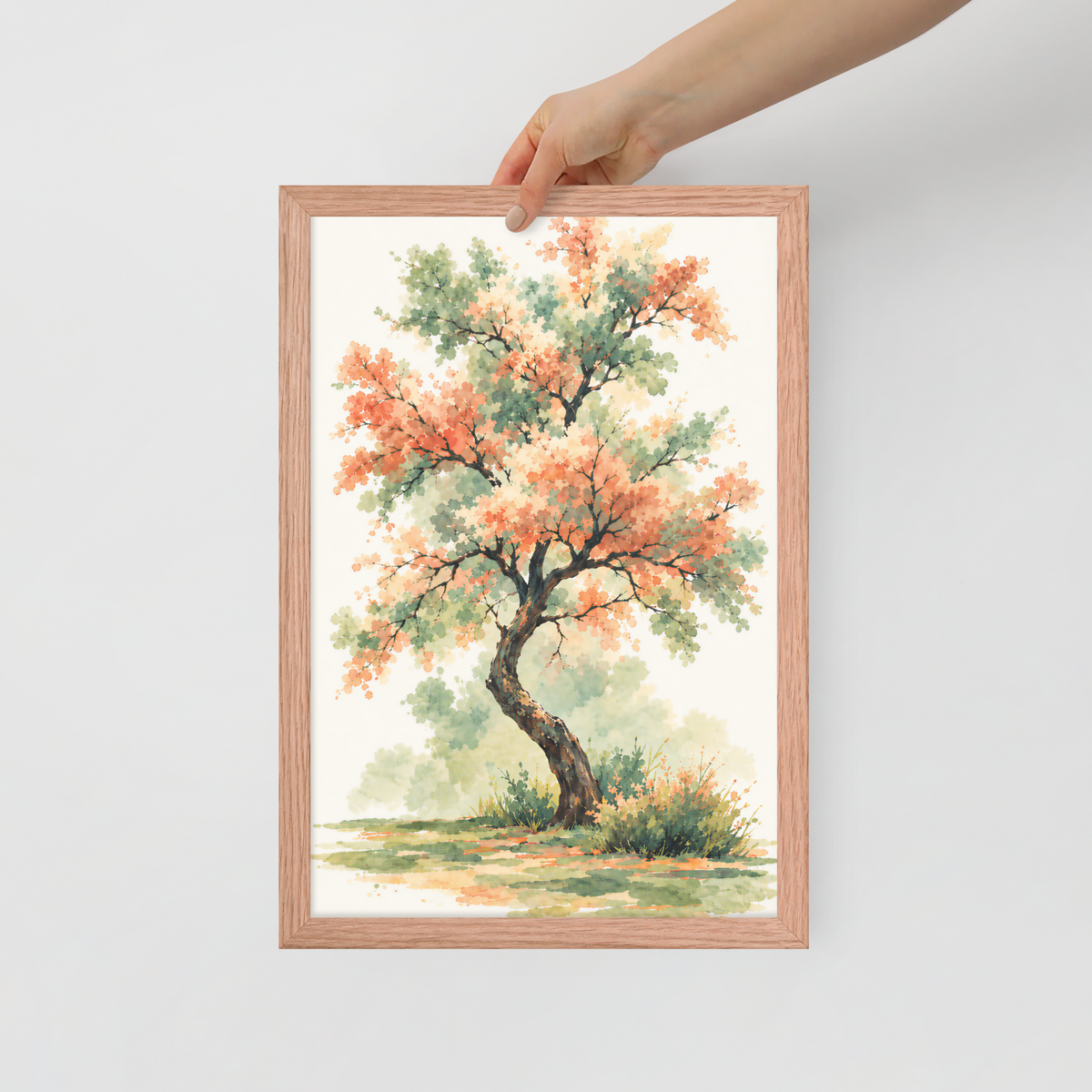Watercolor painting of a blossoming tree with coral and sage green leaves, twisting trunk in a quiet meadow, framed wall art print ready to hang, JMTR Jeometry Store