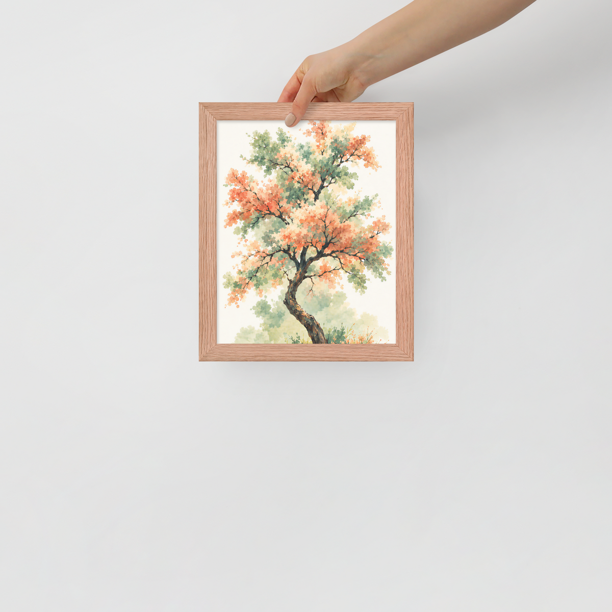 Watercolor painting of a blossoming tree with coral and sage green leaves, twisting trunk in a quiet meadow, framed wall art print ready to hang, JMTR Jeometry Store